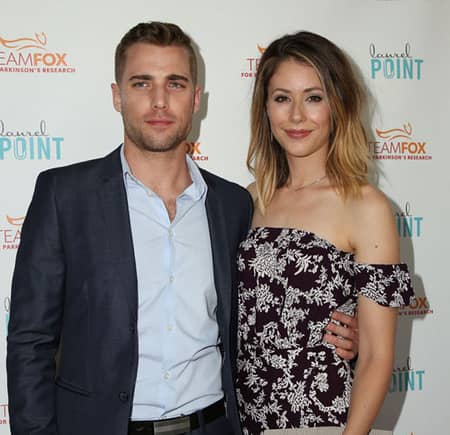 Amanda Crew and Dustin Milligan posing for the Paparazzi Pictures